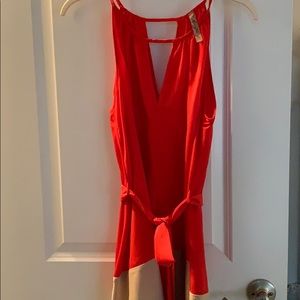 Coral and cream dress with waist-cinching tie